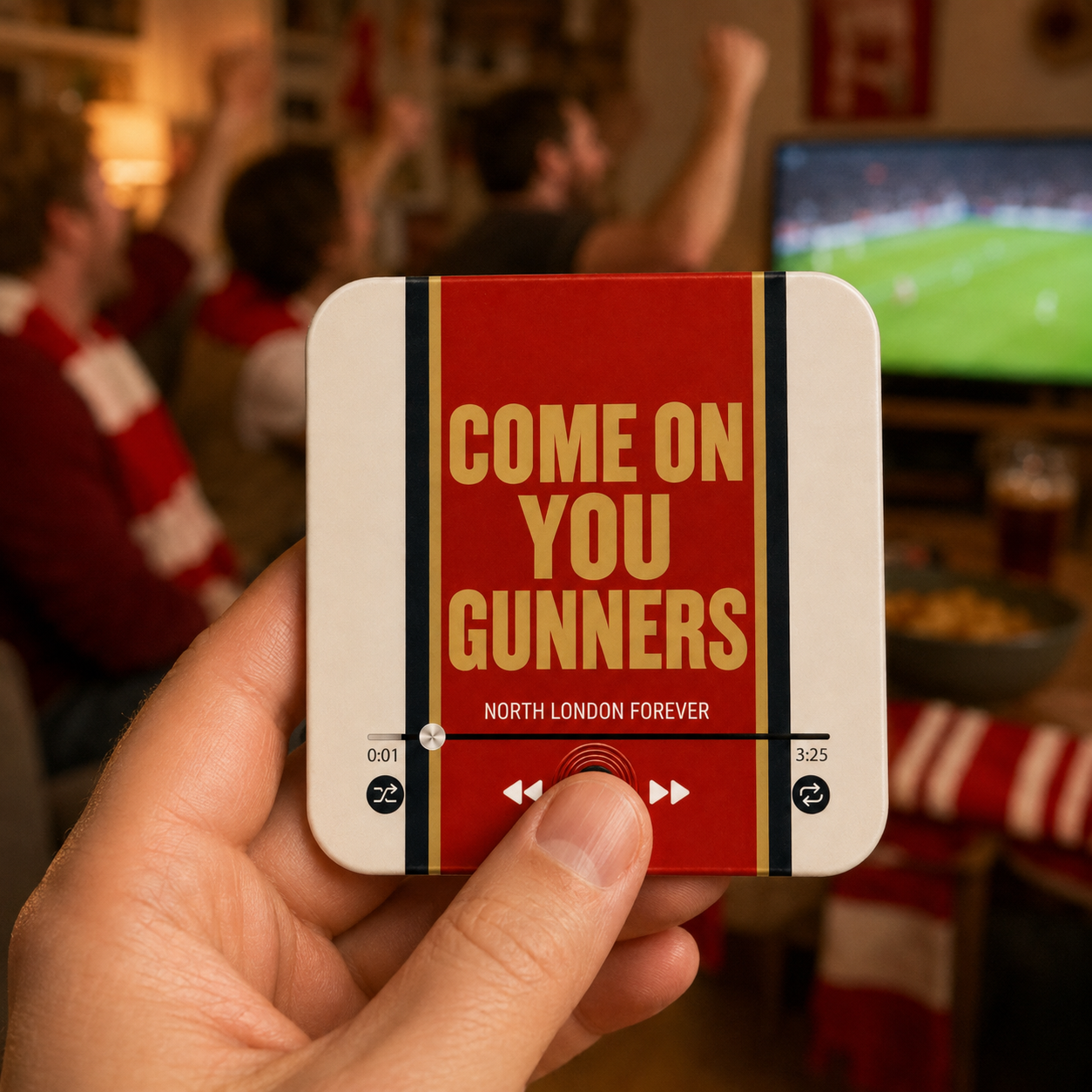 North London Red Football Sound Magnet held in hand during a football match at home